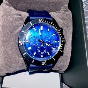 Used man Bulova  watch . Navy blue color one size fits most .in great condition